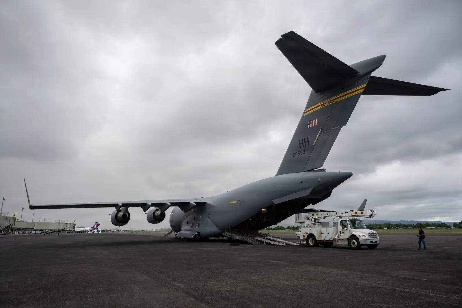 C-17 Globemaster loading a utility bucket truck for Kauaʻi