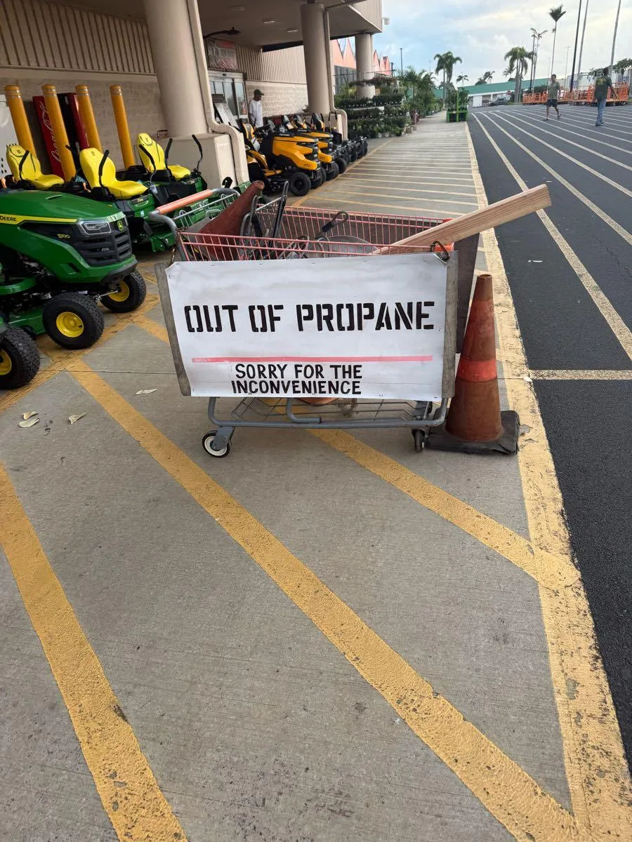 Empty propane tank cart at a hardware store before Hurricane Lowell