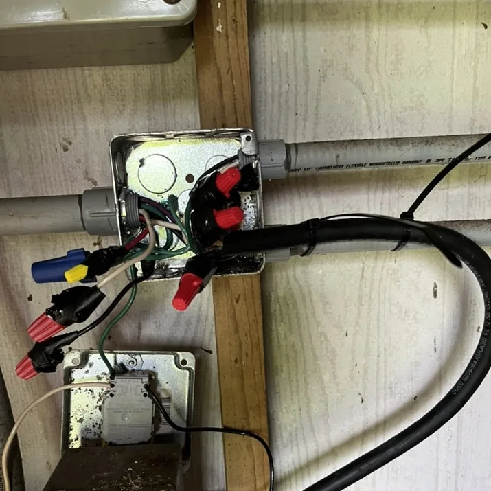 Generator lead spliced into the pump-house junction box